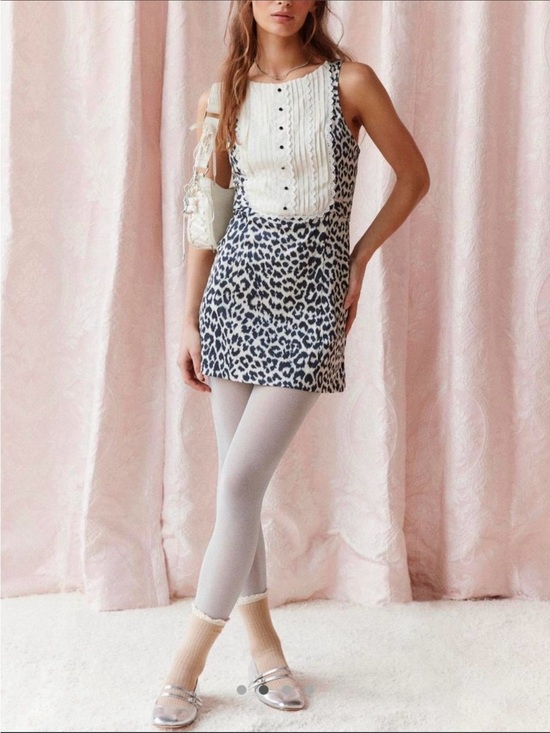 Urban Outfitters Dresses & Skirts - Urban Outfitters Black & White Leopard Mini Dress with Cream Bib